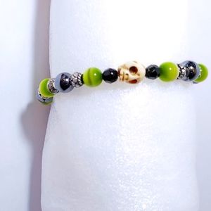 Handcrafted green glass beads skull charm bracelet